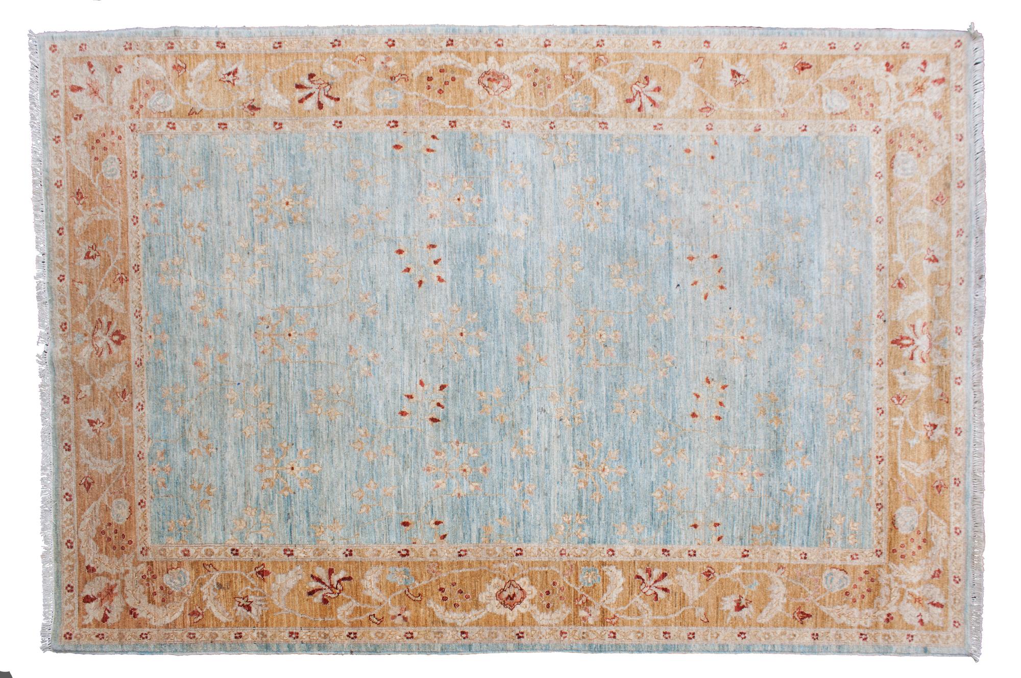 An Oushak Style Indian Wool Rug 9 feet 9 inches x 6 feet 8 inches. — 20TH CENTURY