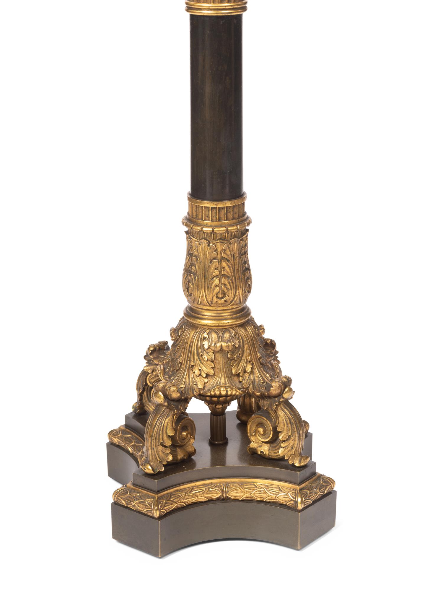 A Pair of French Neoclassical Gilt and Patinated Bronze Seven-Light Candelabra