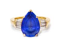A 14 Karat Yellow Gold, Tanzanite and Diamond Ring, 5.00 dwts.