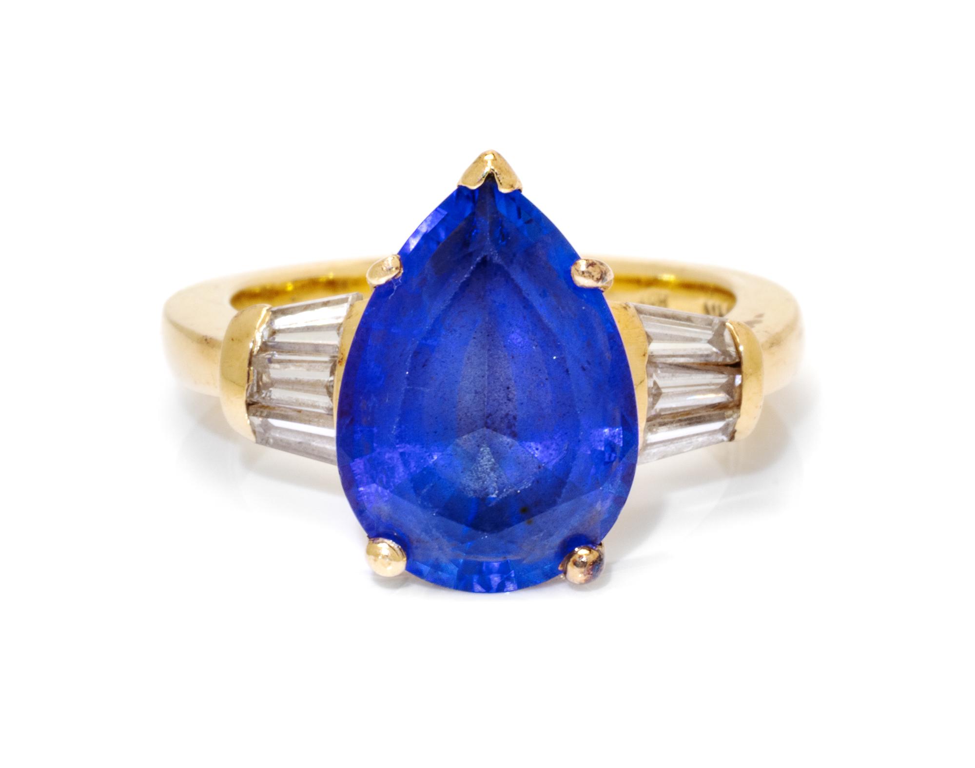 A 14 Karat Yellow Gold, Tanzanite and Diamond Ring, 5.00 dwts.