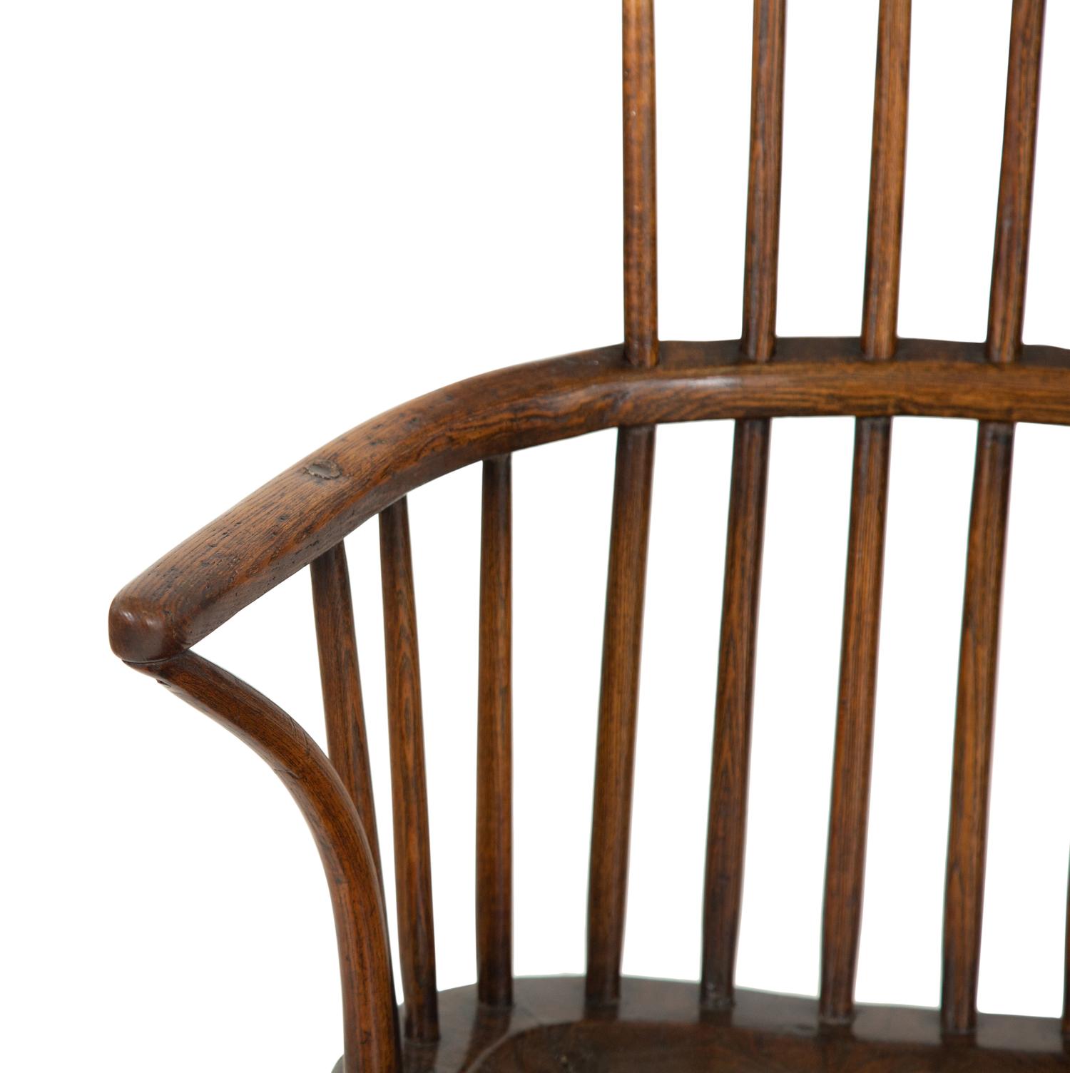 A George III Oak Comb-Back Windsor Armchair