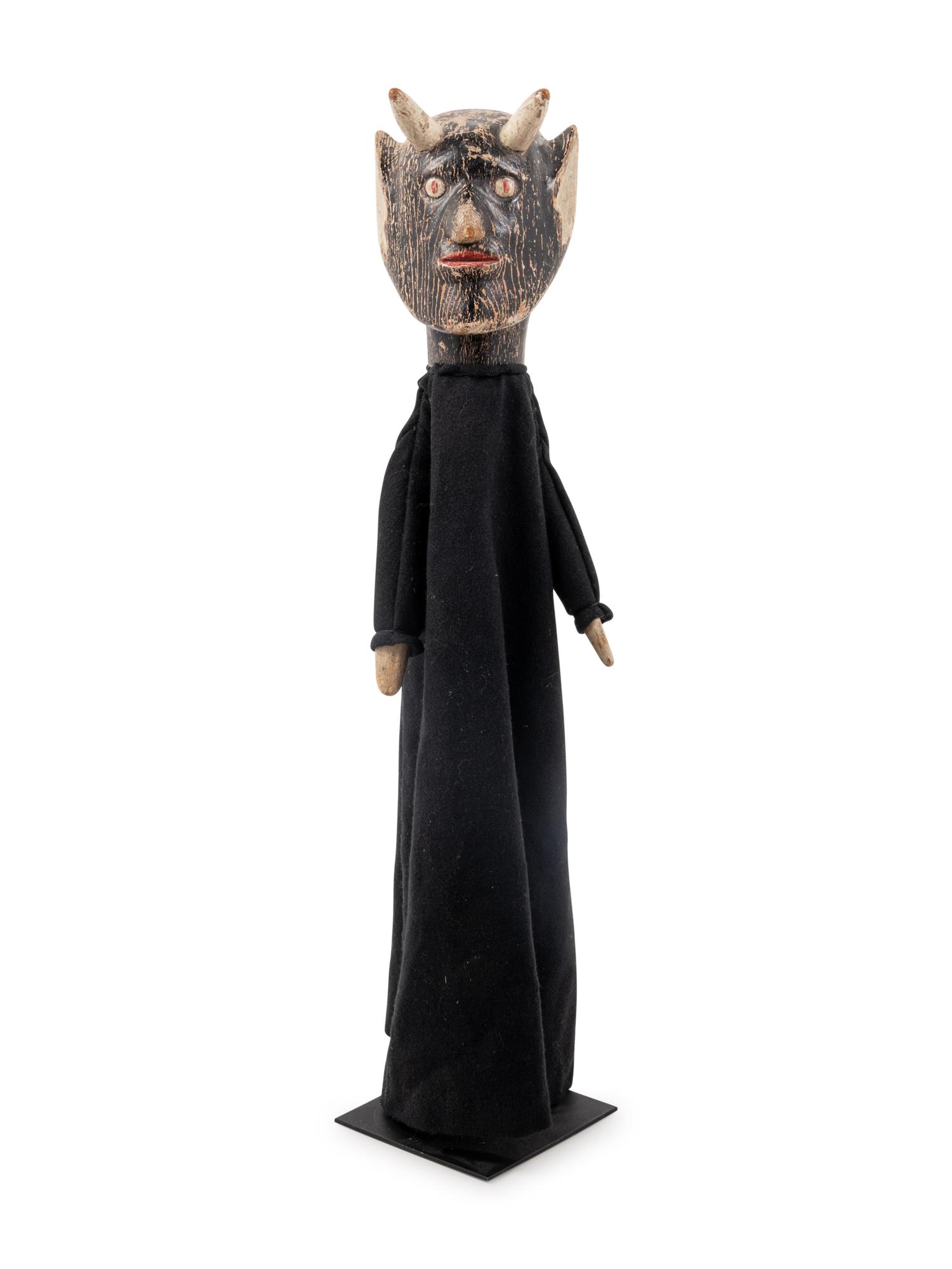 A Carved Wood Puppet