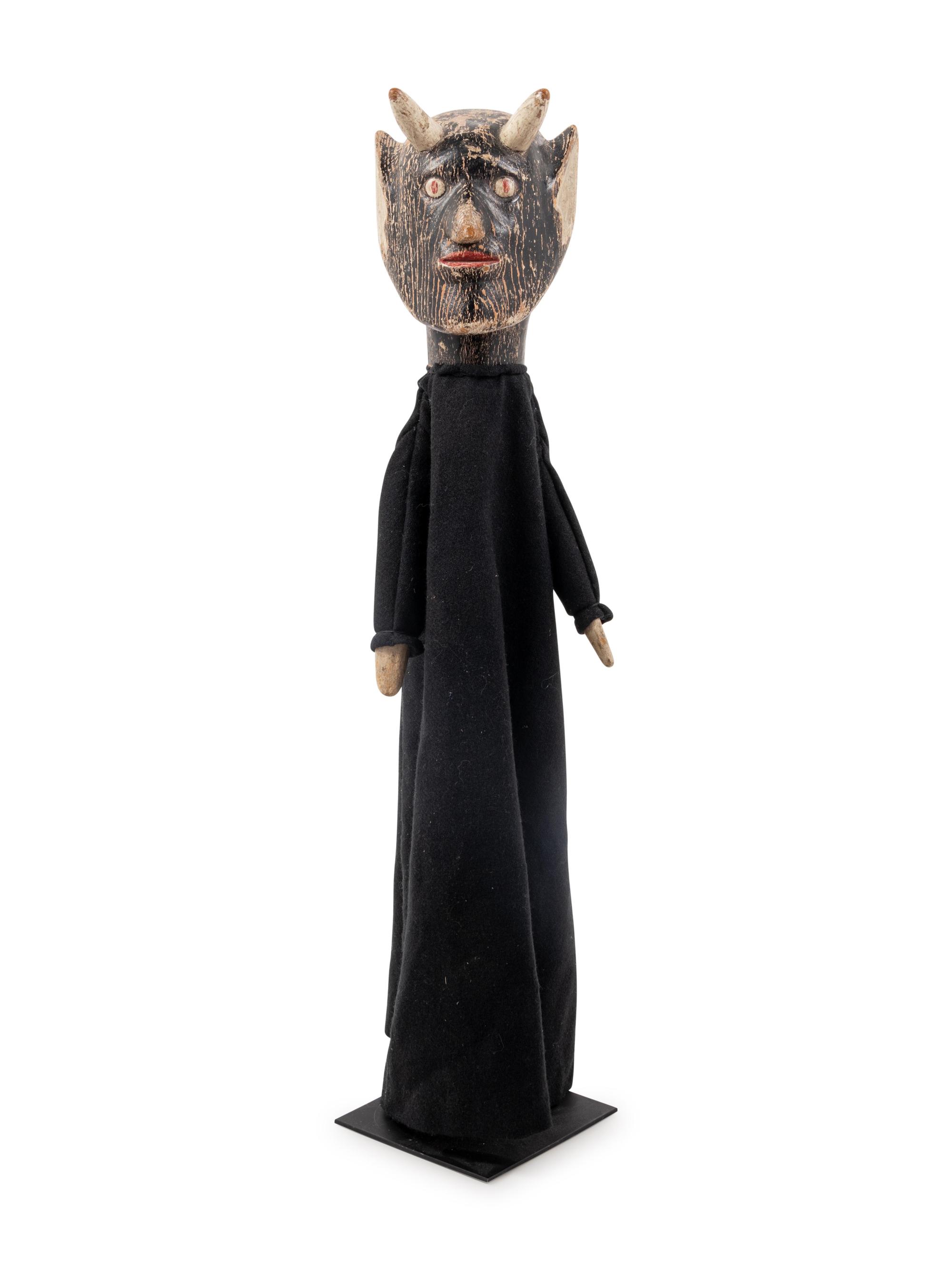 A Carved Wood Puppet