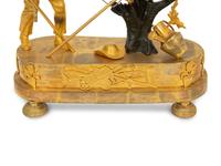 A Restauration Gilt and Patinated Bronze "Gardener" Clock