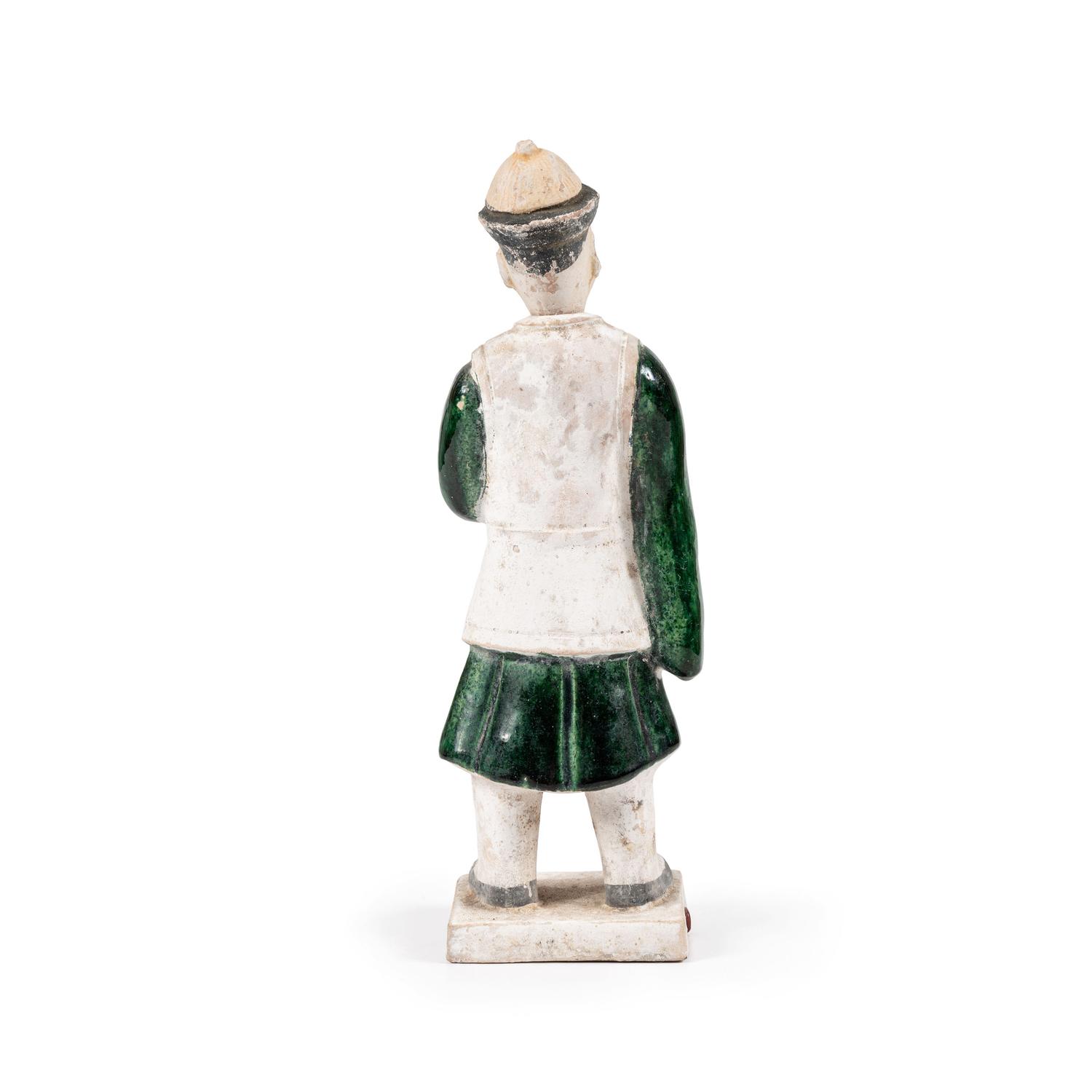 A Chinese Terracotta Figure with Polychrome Decoration