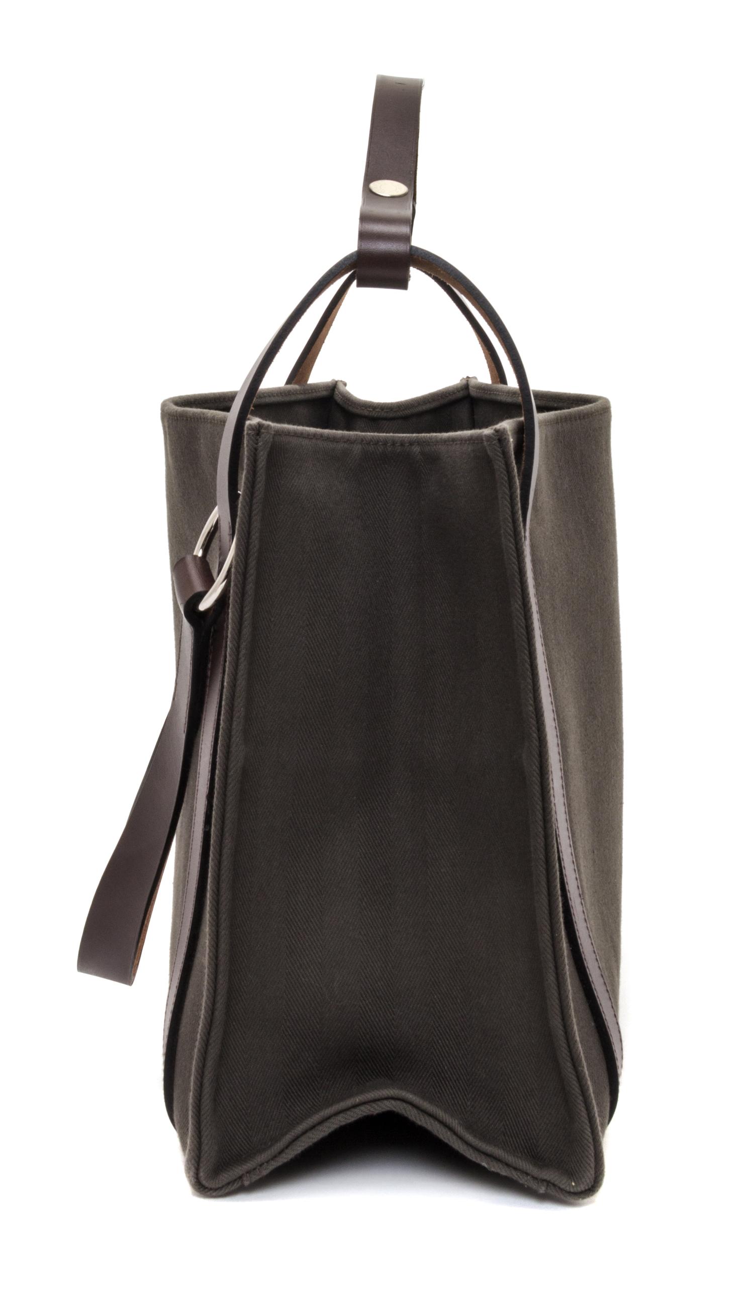 An Hermes Vert de Gris Canvas and Ebene Vache Cabalicol Tote, 15.5" x 11.5" x 6.5".