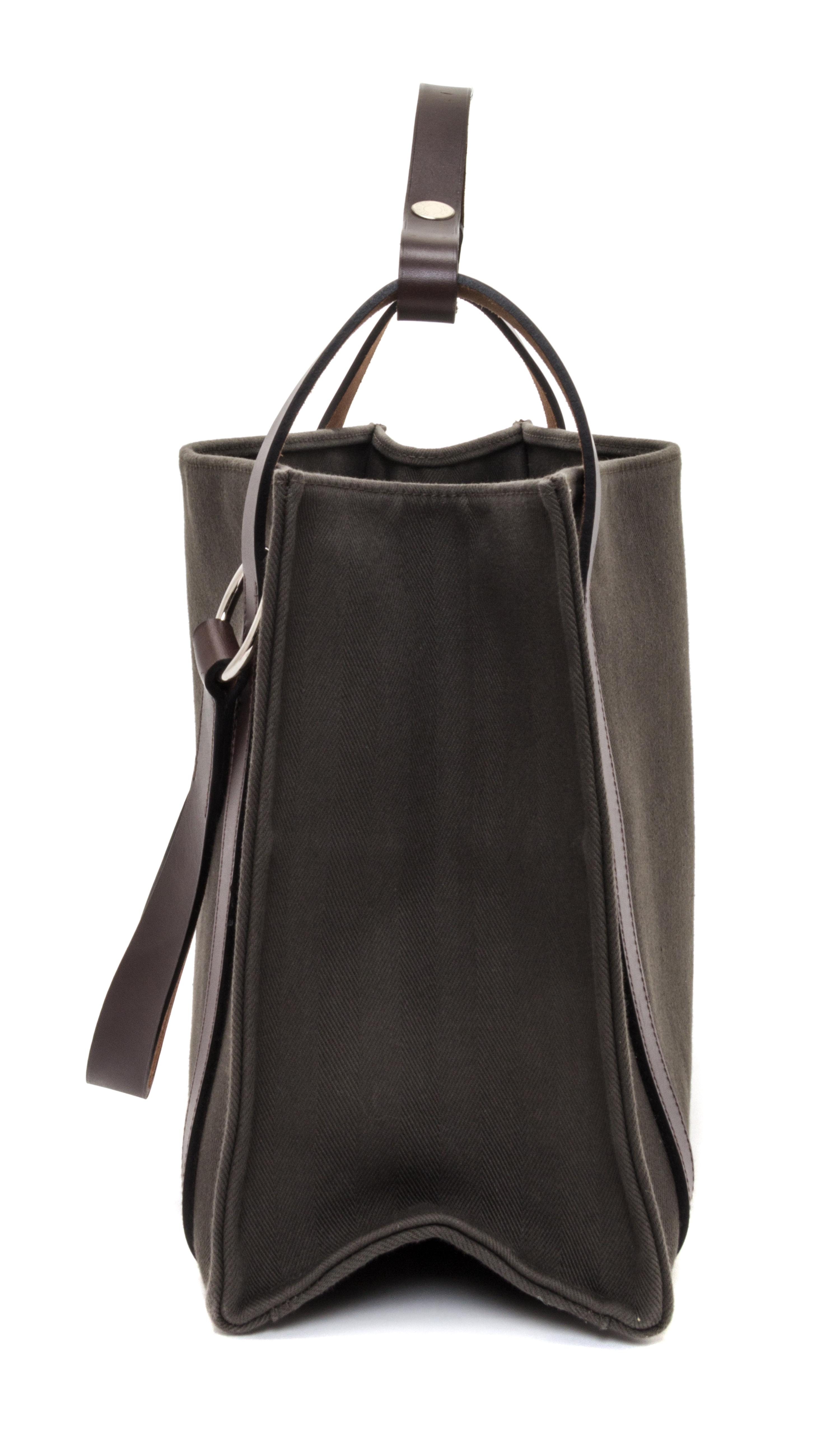 An Hermes Vert de Gris Canvas and Ebene Vache Cabalicol Tote, 15.5" x 11.5" x 6.5".