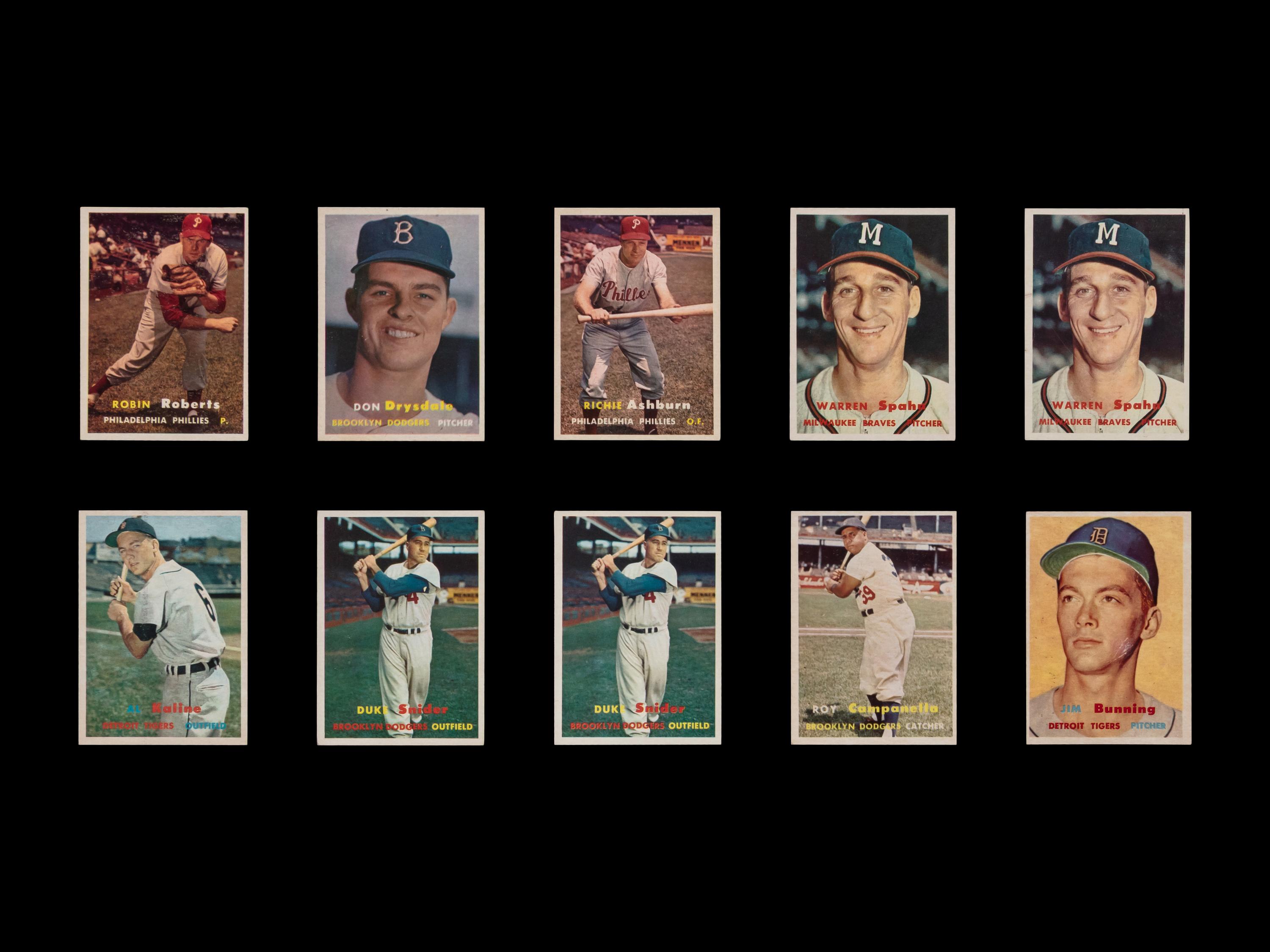A Collection of 1957 Topps Baseball Cards Including Hall of Famers and Rookies (241)