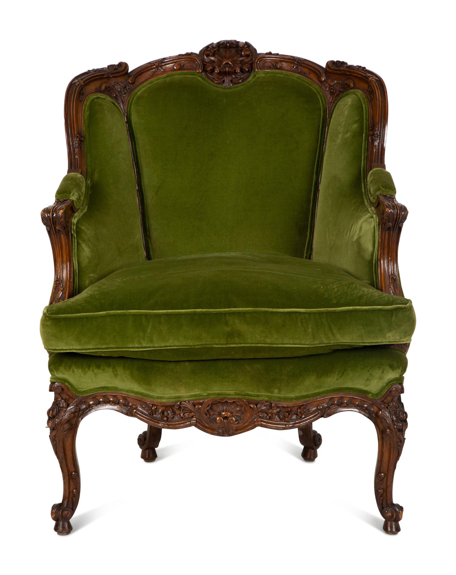 A Louis XV Style Carved Fruitwood Bergère à Oreilles