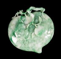 An Apple Green and Celadon Jadeite Peach-Form Ink Palette Length 9 7/8 inches. — 20TH CENTURY