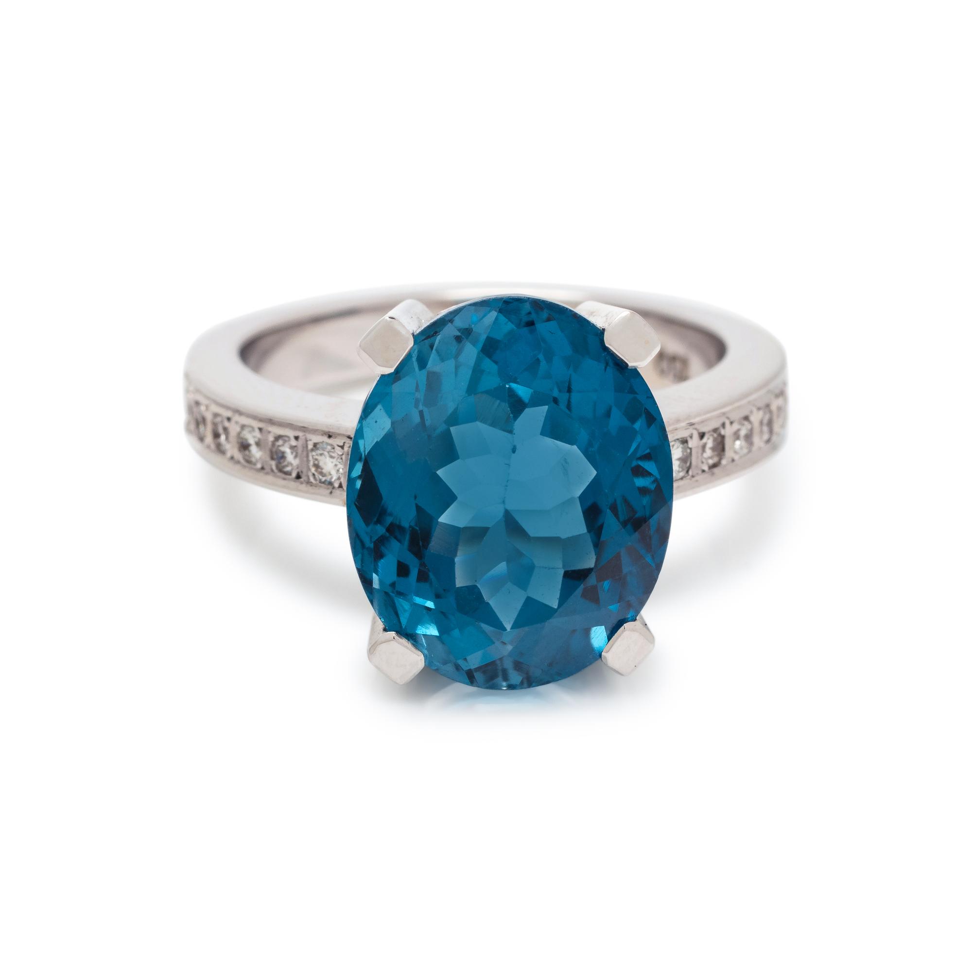 BLUE TOPAZ AND DIAMOND RING