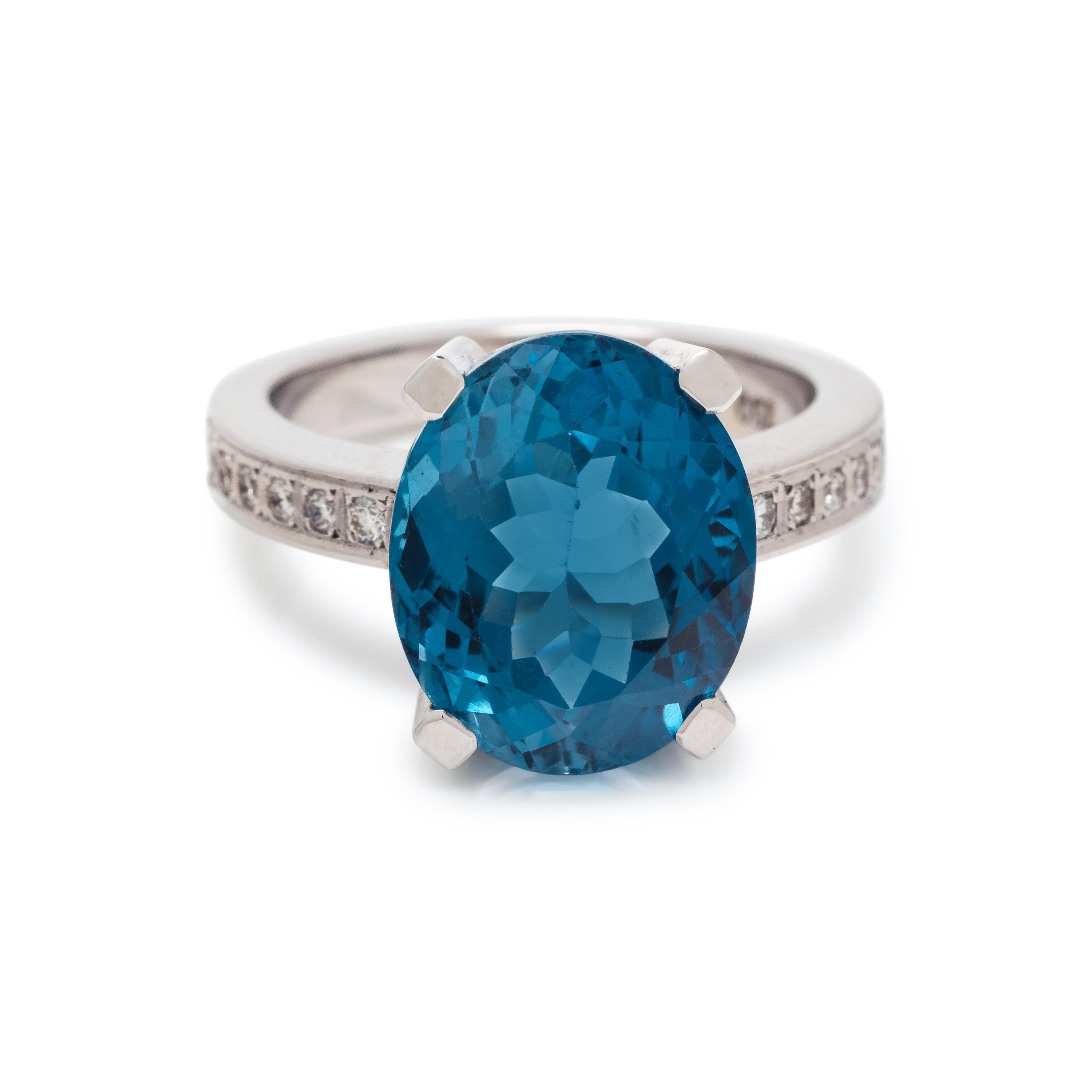 BLUE TOPAZ AND DIAMOND RING