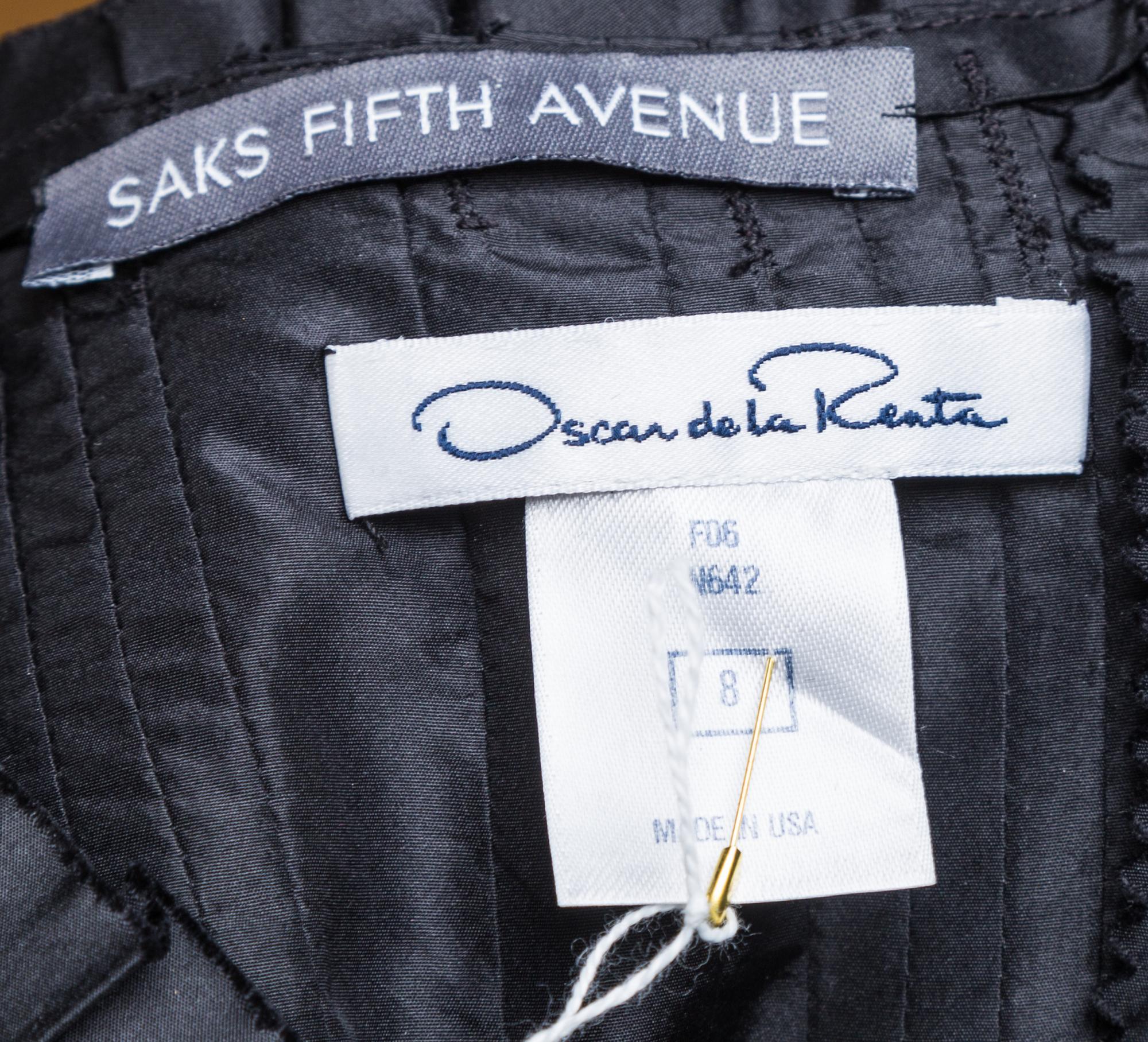 An Oscar de la Renta Black Silk Cocktail Dress, Size 8.