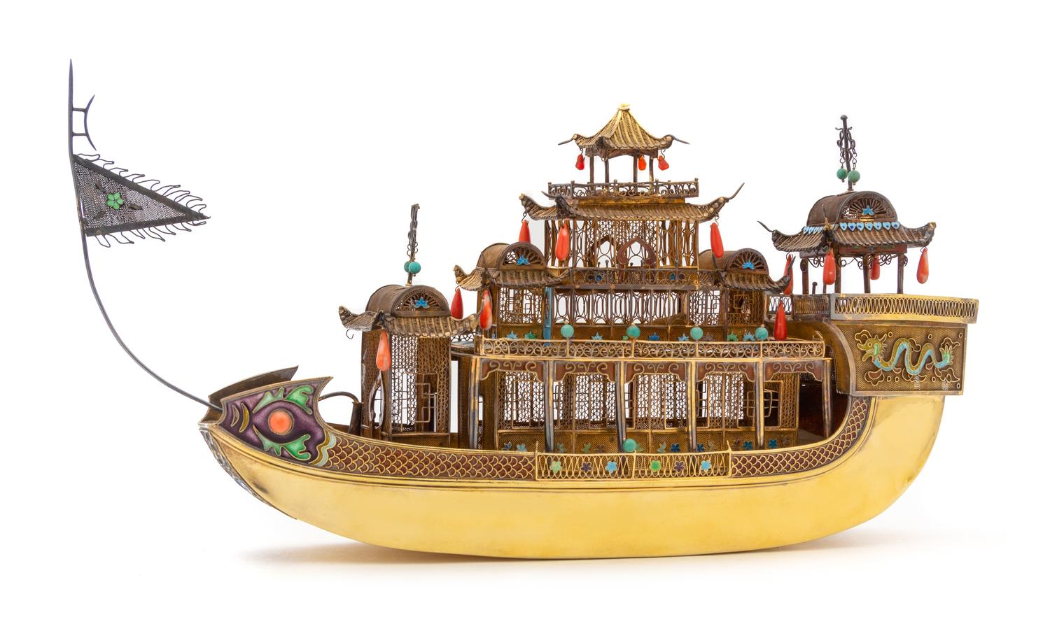 A Chinese Export Silver-Gilt and Enameled Model of a Hua Fang Ship, 20th Century, the three-tiered ship with coral and turquoise embell