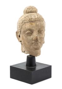 An Indian Gandharan Stucco Head of Buddha 3RD/4TH CENTURY Height overall 12 inches. — 3RD/4TH CENTURY