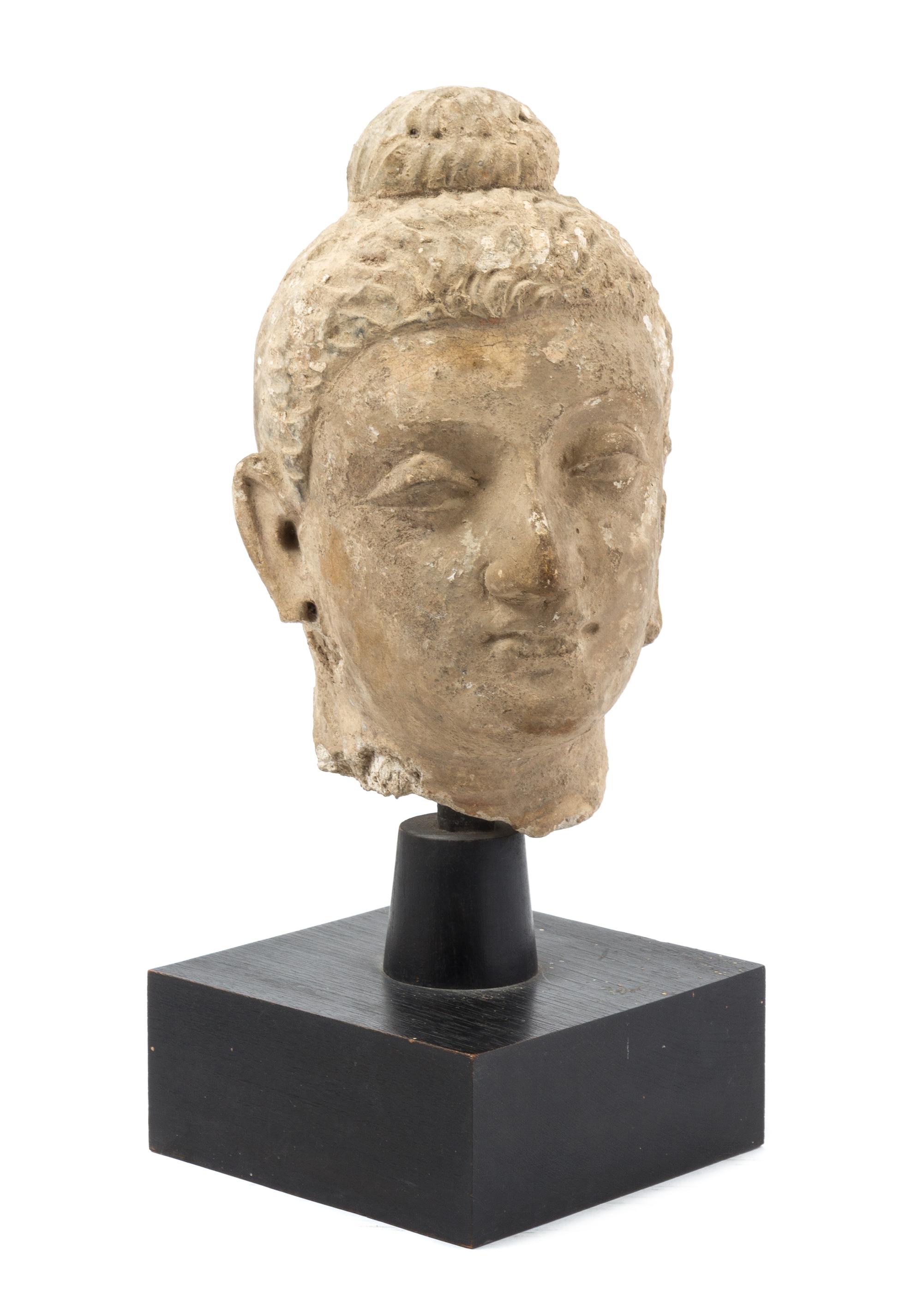 An Indian Gandharan Stucco Head of Buddha 3RD/4TH CENTURY Height overall 12 inches. — 3RD/4TH CENTURY