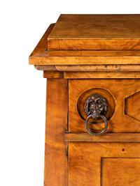 A Continental Figured Birch Commode