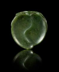 A Small Spinach Jade Peach-Form Brush Rest Length 2 1/8 inches.