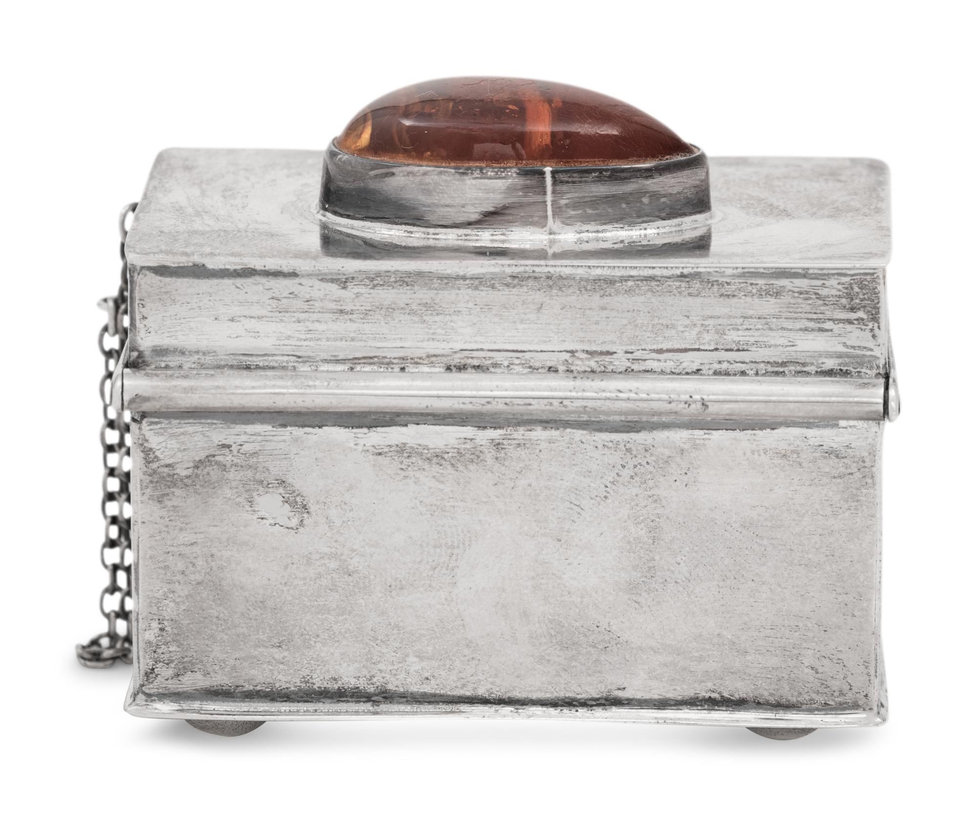 A Polish Silver Trinket Box with Inlaid Amber Cartouche