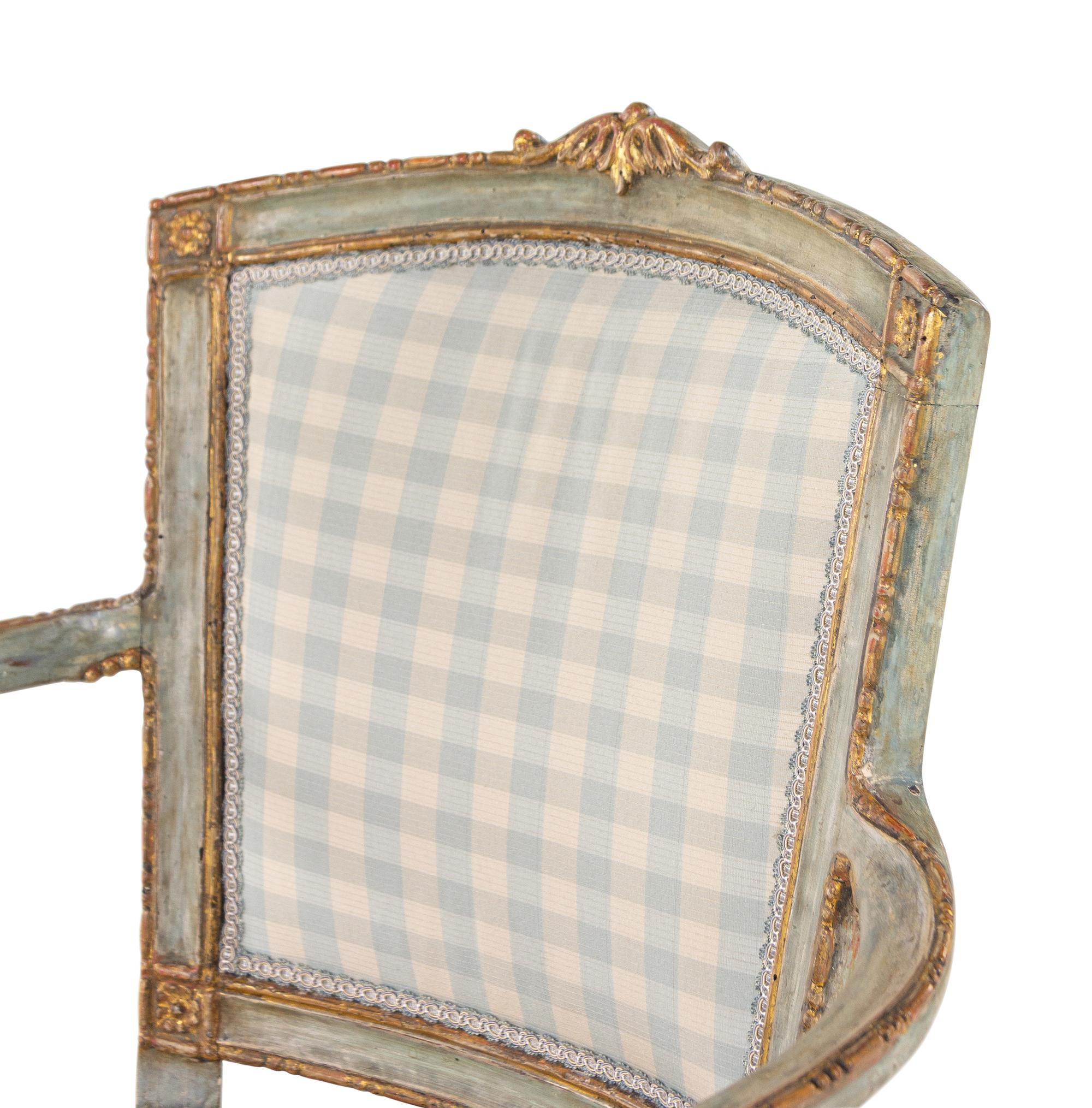A Pair of Venetian Painted and Parcel Gilt Armchairs