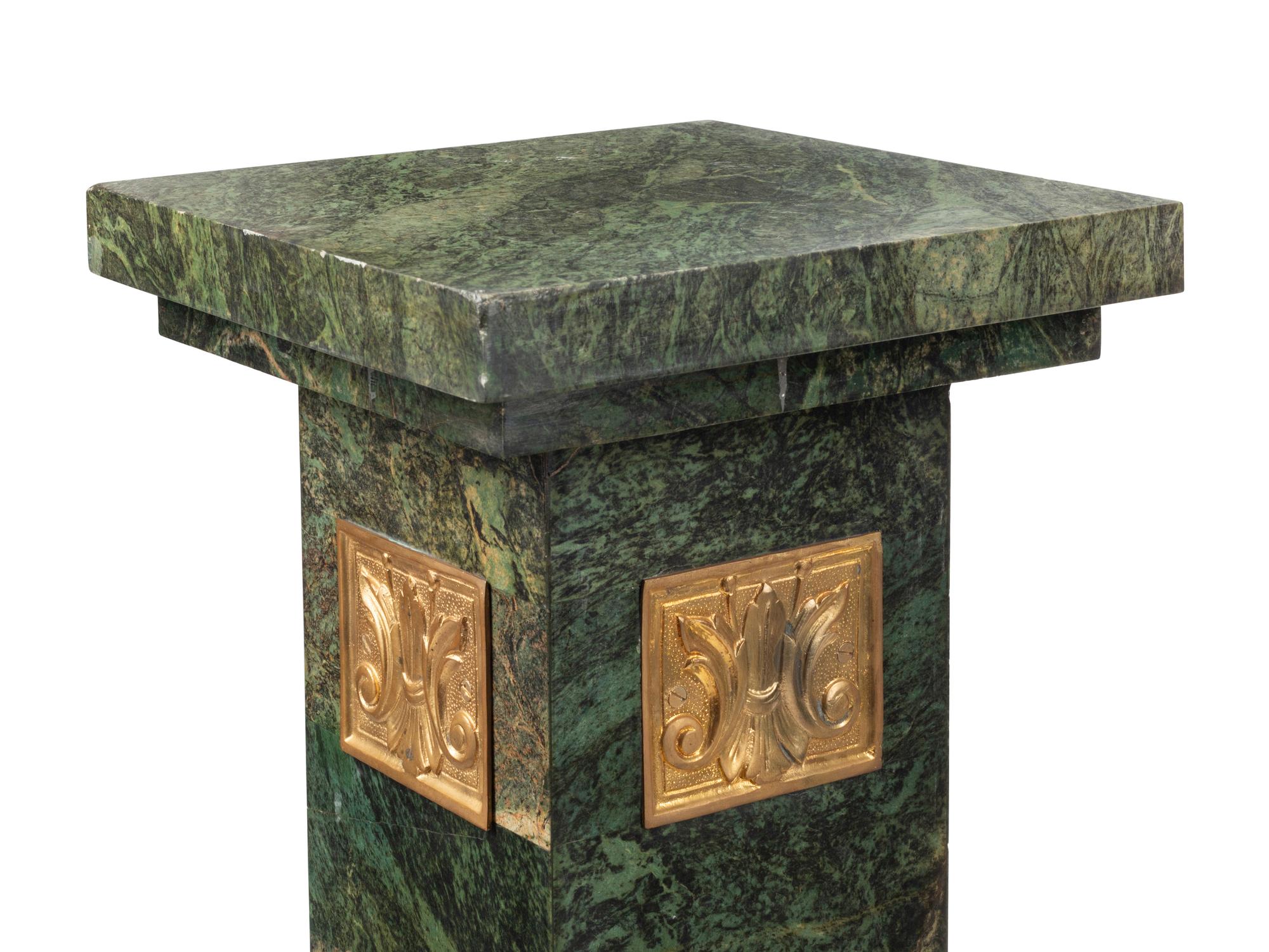 A Pair of Continental Gilt Bronze Mounted Marble Pedestals