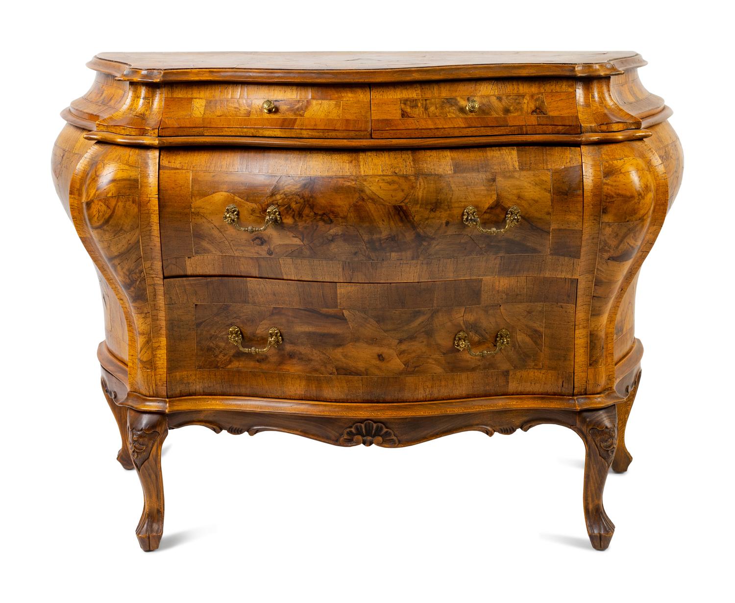 An Italian Rococo Style Olivewood Bombe Commode