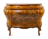 An Italian Rococo Style Olivewood Bombe Commode