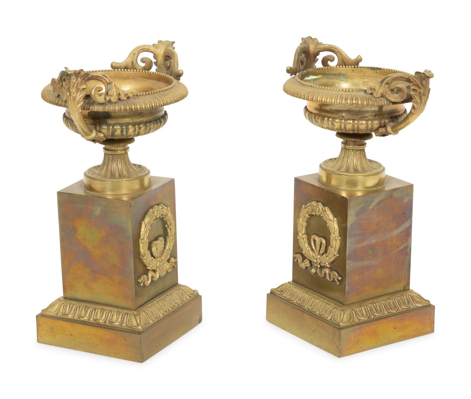 A Pair of Empire Gilt Bronze Urns on Pedestal Bases