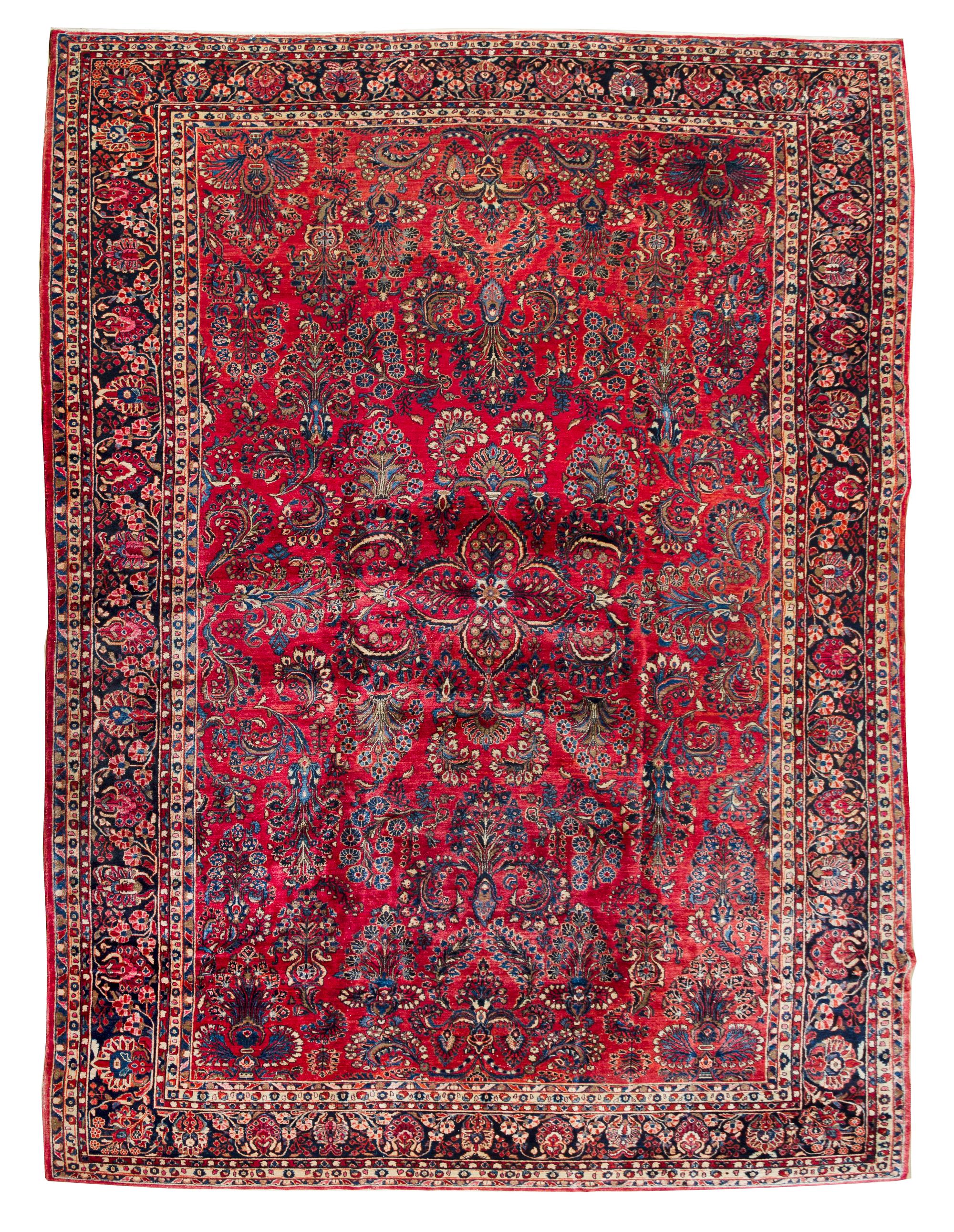 A Sarouk Wool Rug 16 feet 8 inches x 9 feet 11 inches. — CIRCA 1920s