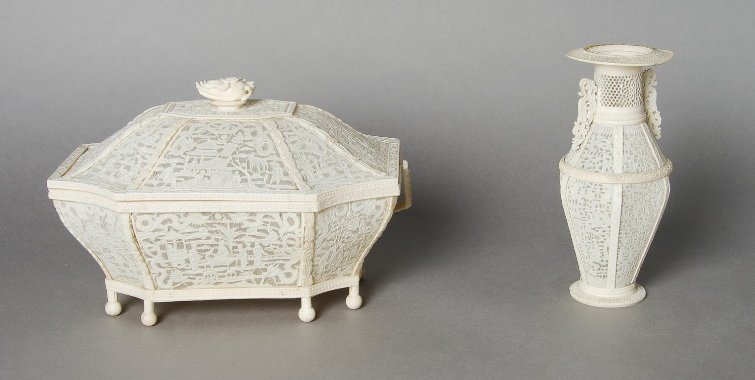 A Chinese Pierced Ivory Lidded Basket, Height 7 x width 11 x depth 7 inches.