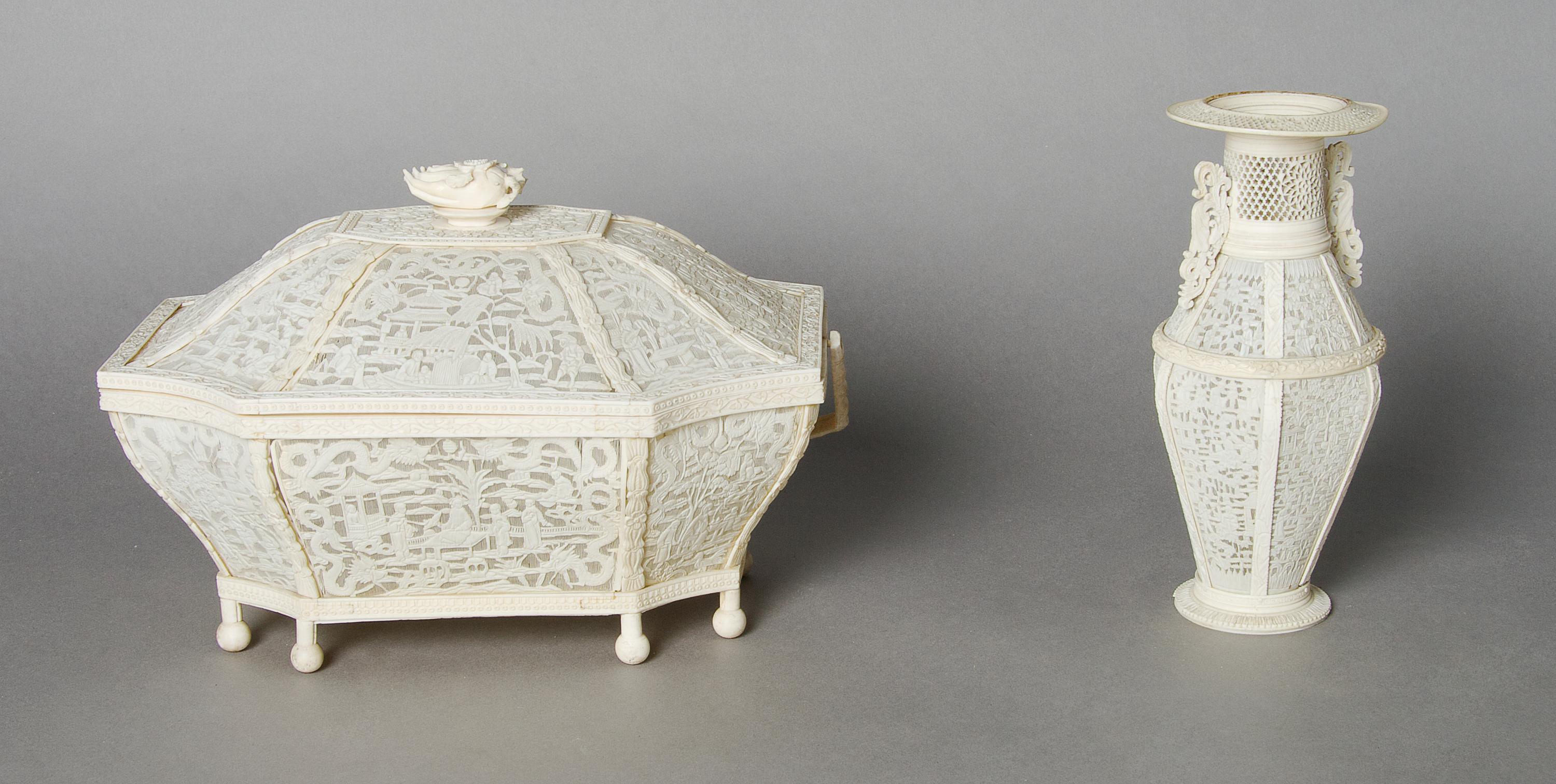 A Chinese Pierced Ivory Lidded Basket, Height 7 x width 11 x depth 7 inches.