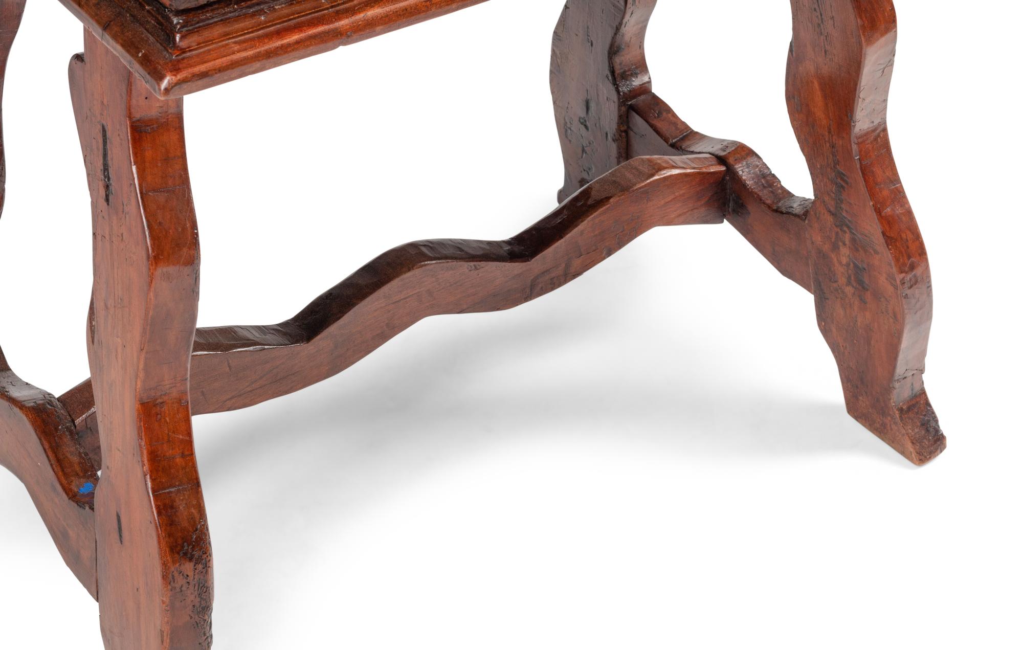An Italian Baroque Walnut Trestle Table