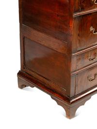 A George II Walnut and Oak Chest of Drawers
