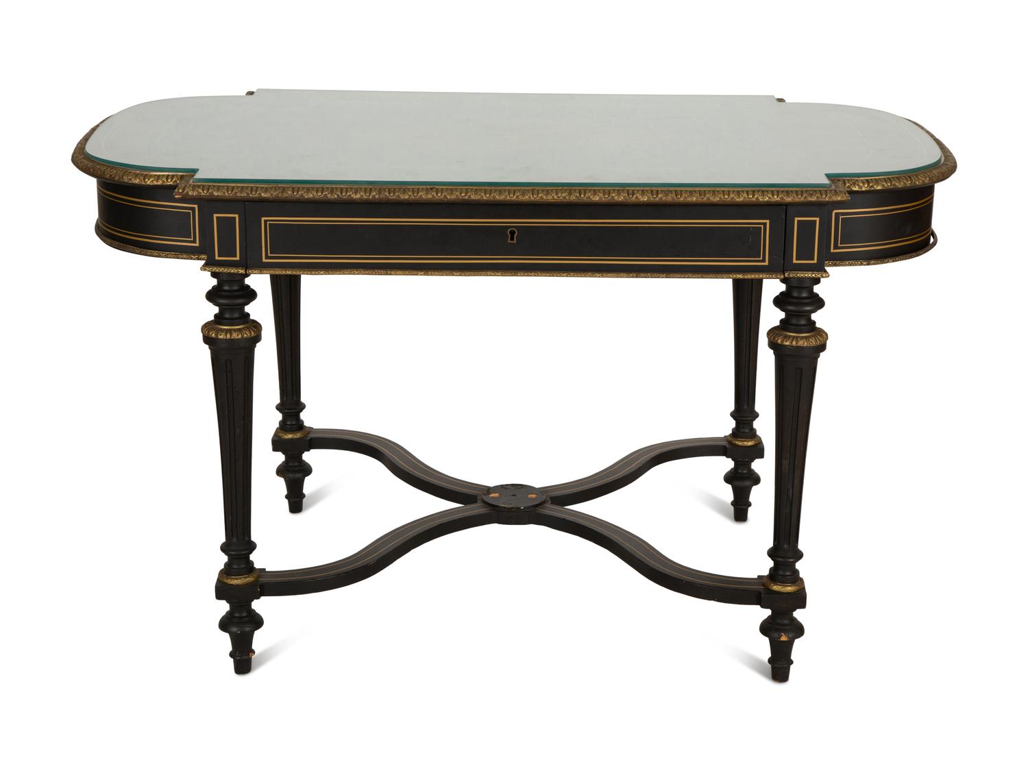 A Napoleon III Style Gilt-Bronze Mounted Ebonized Center Table