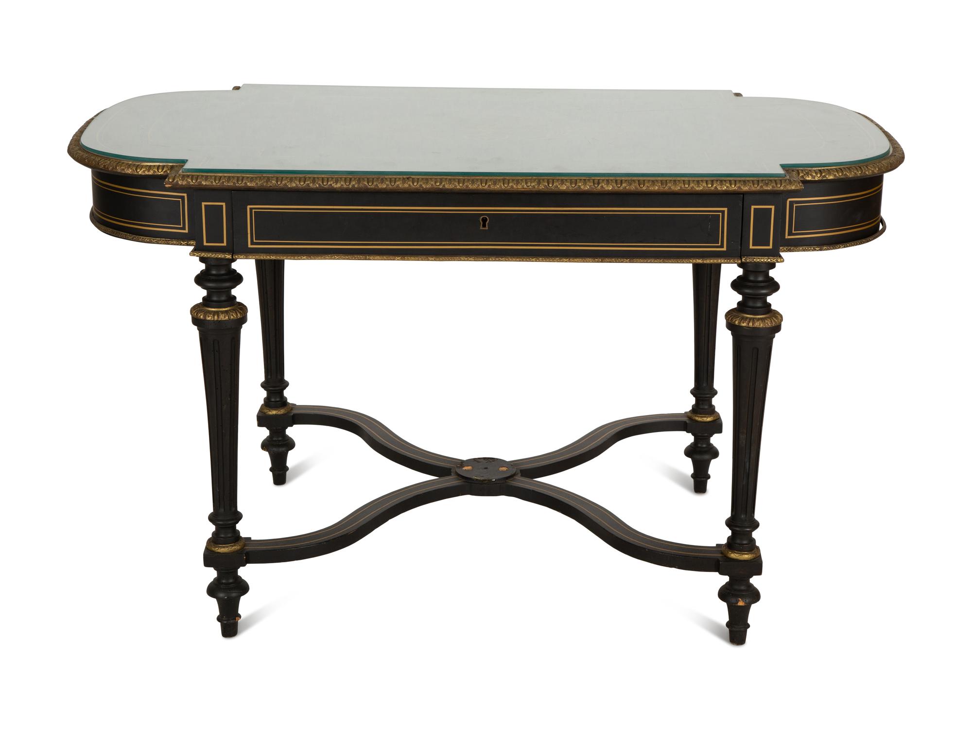 A Napoleon III Style Gilt-Bronze Mounted Ebonized Center Table