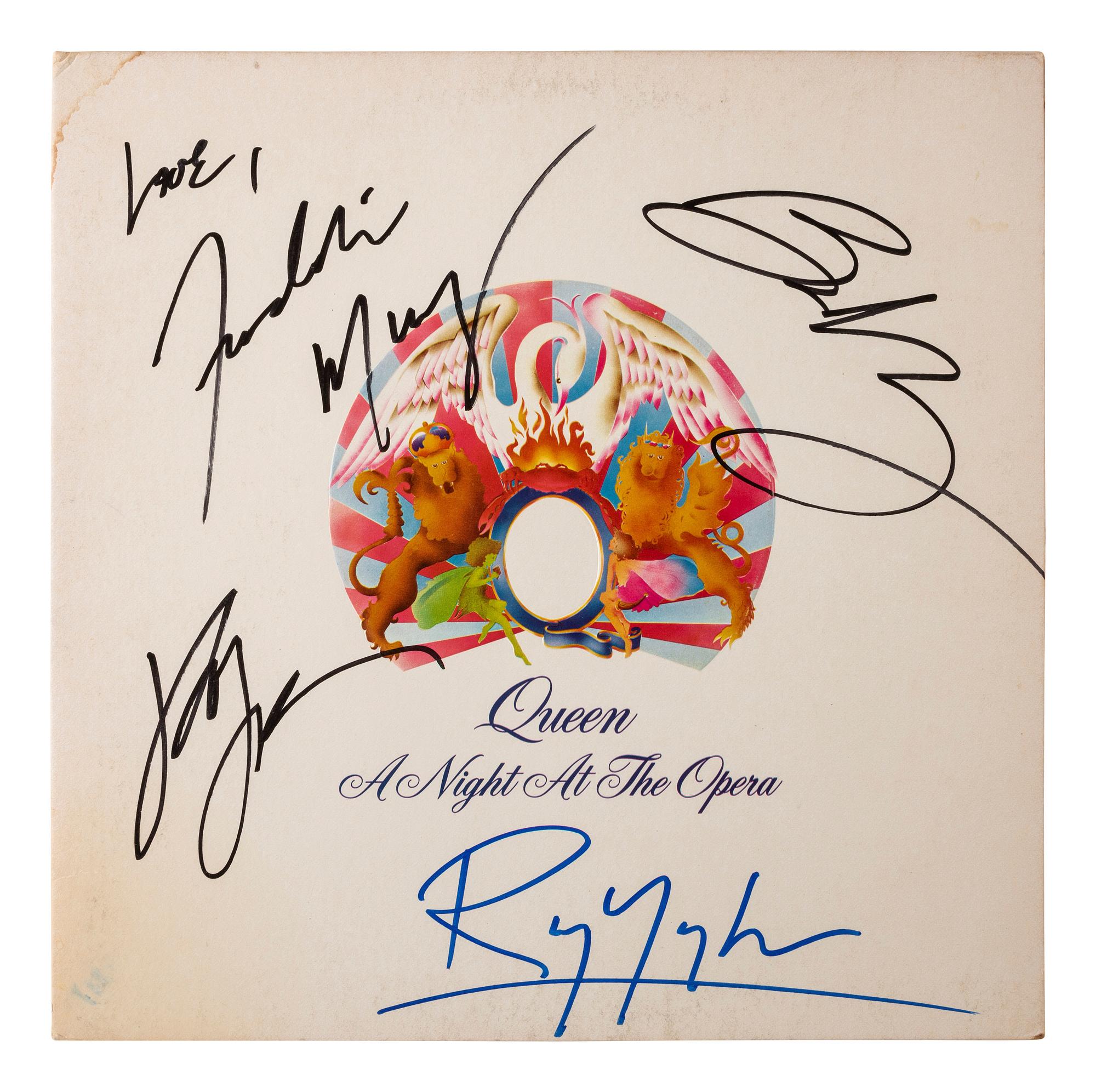 [MUSIC]. "A Night at the Opera" album cover autographed by band members incl. Freddie Mercury.
