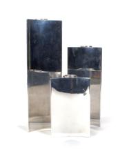 A Set of Three Danish Graduated Candlesticks, Georg Jensen, Height of tallest 9 1/4 inches.