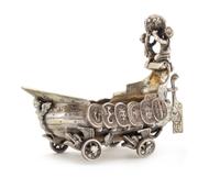 A Louis XV Silver Salt Nef, Robert Mothe, Paris, Circa 1725, the stern surmounted by two putti hoisting a globe worked to show fleurs-d