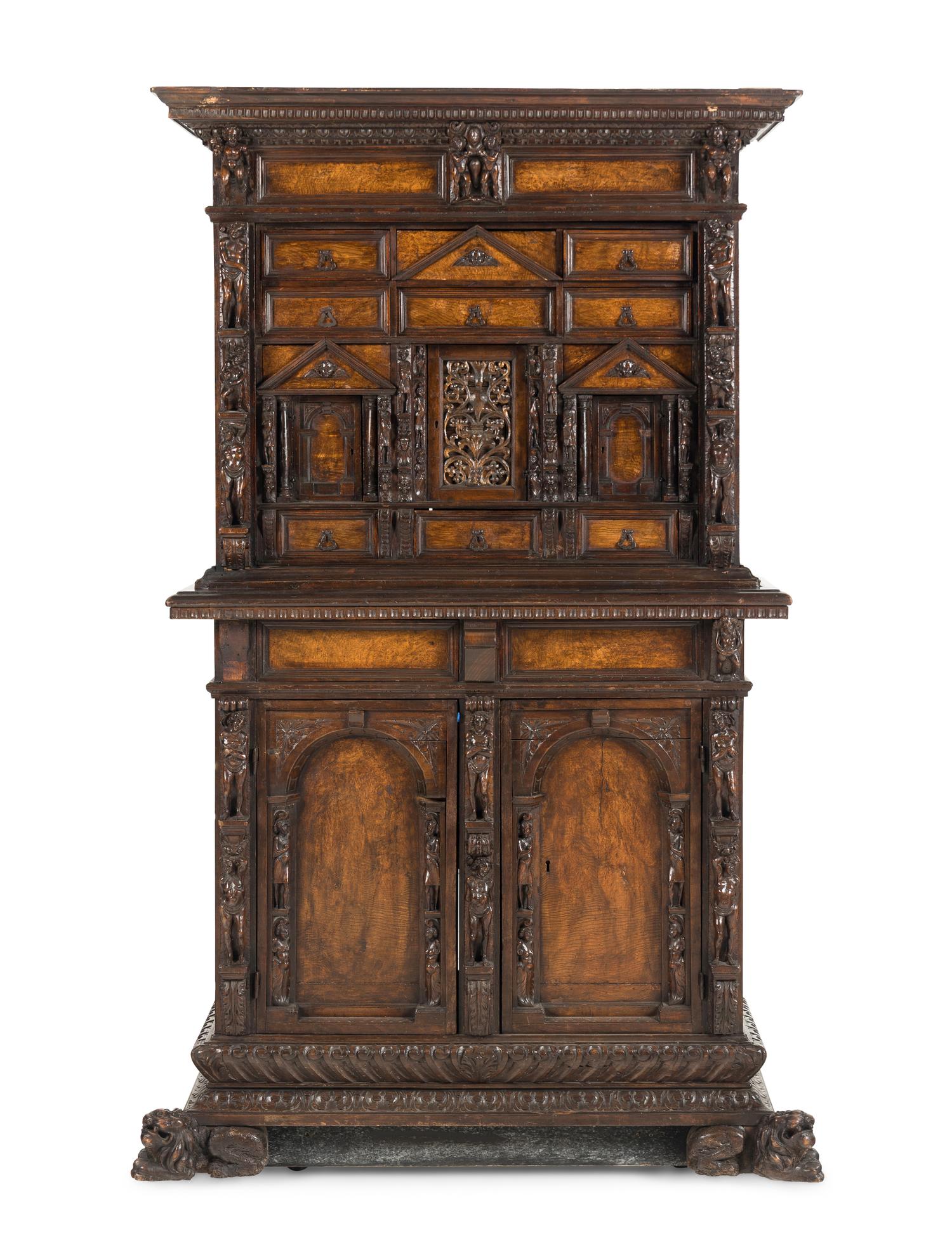 An Italian Renaissance Style Walnut Cabinet