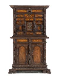 An Italian Renaissance Style Walnut Cabinet