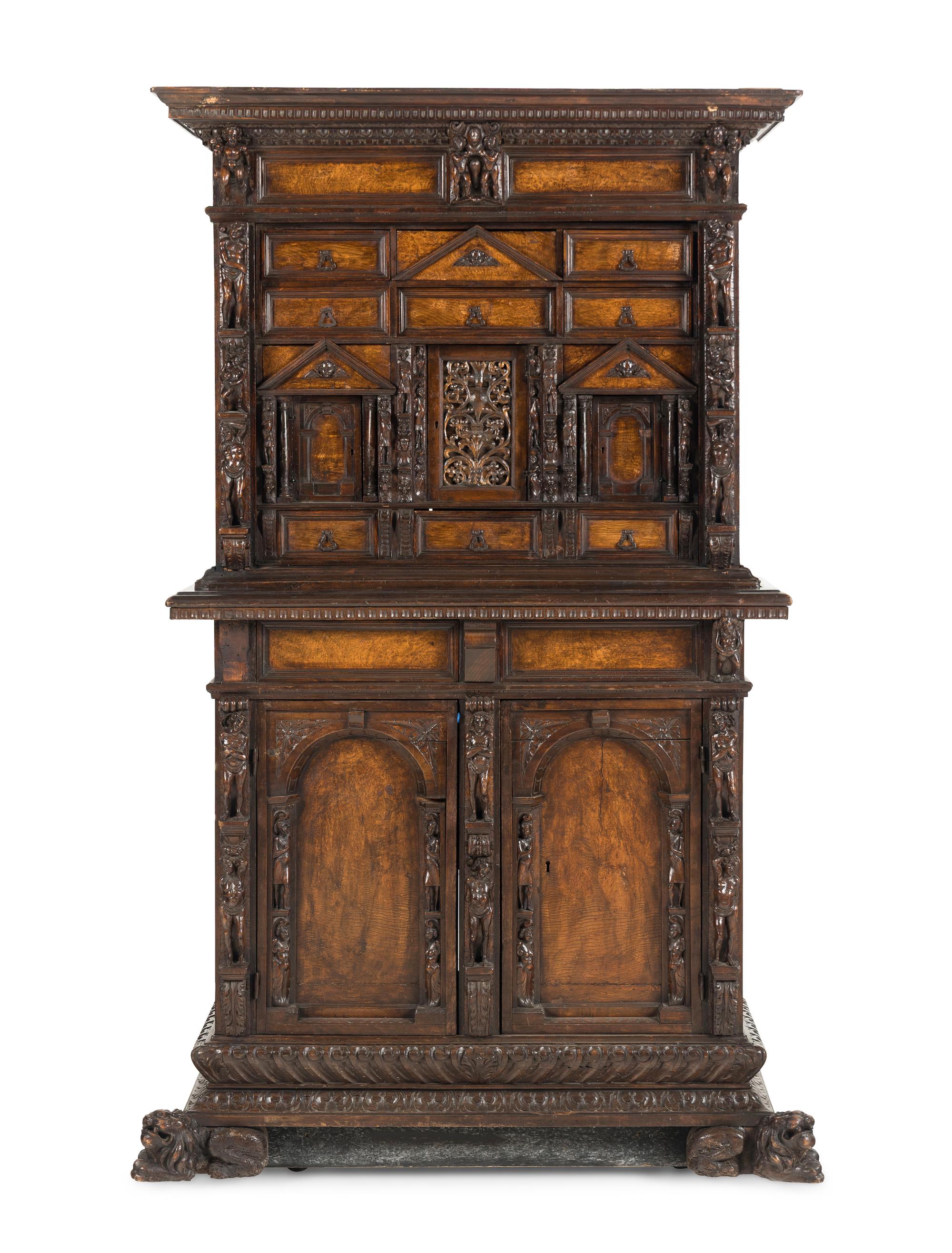An Italian Renaissance Style Walnut Cabinet