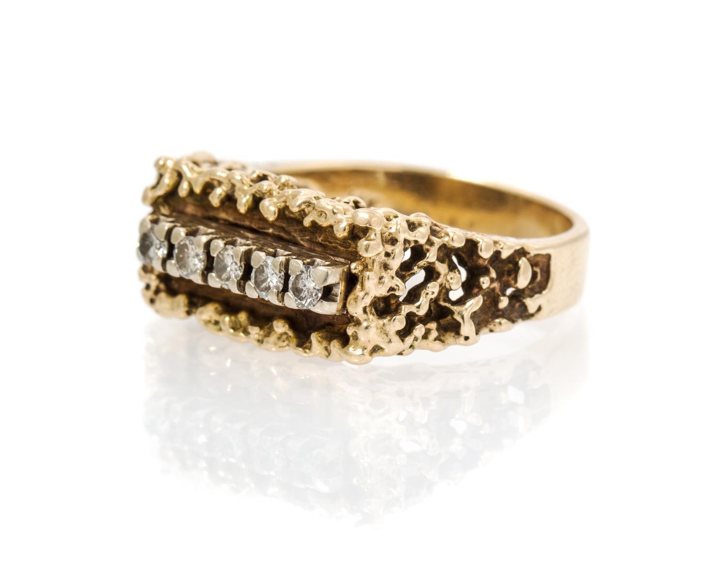 A 14 Karat Yellow Gold and Diamond Ring, 7.10 dwts.