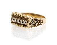 A 14 Karat Yellow Gold and Diamond Ring, 7.10 dwts.