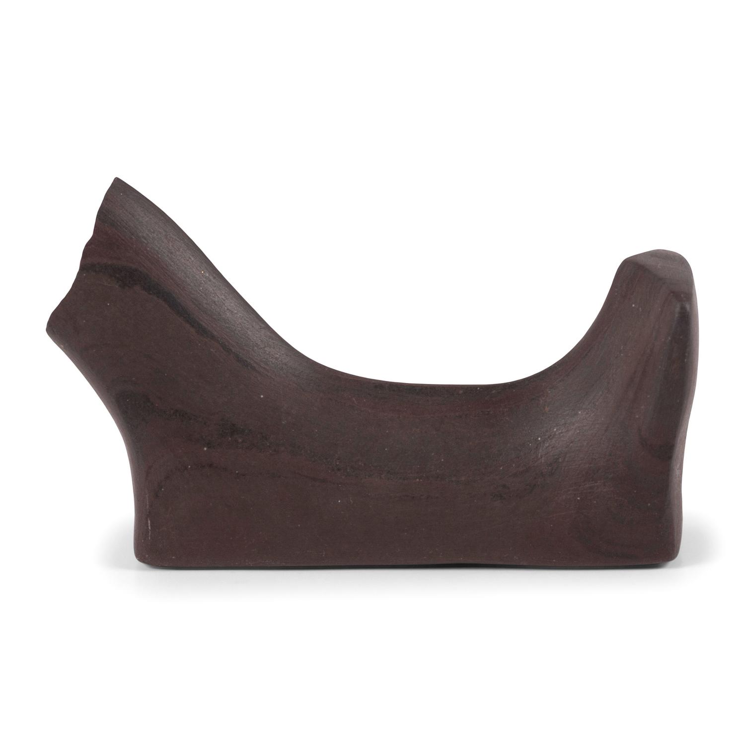 A Banded Red Slate Headless Birdstone