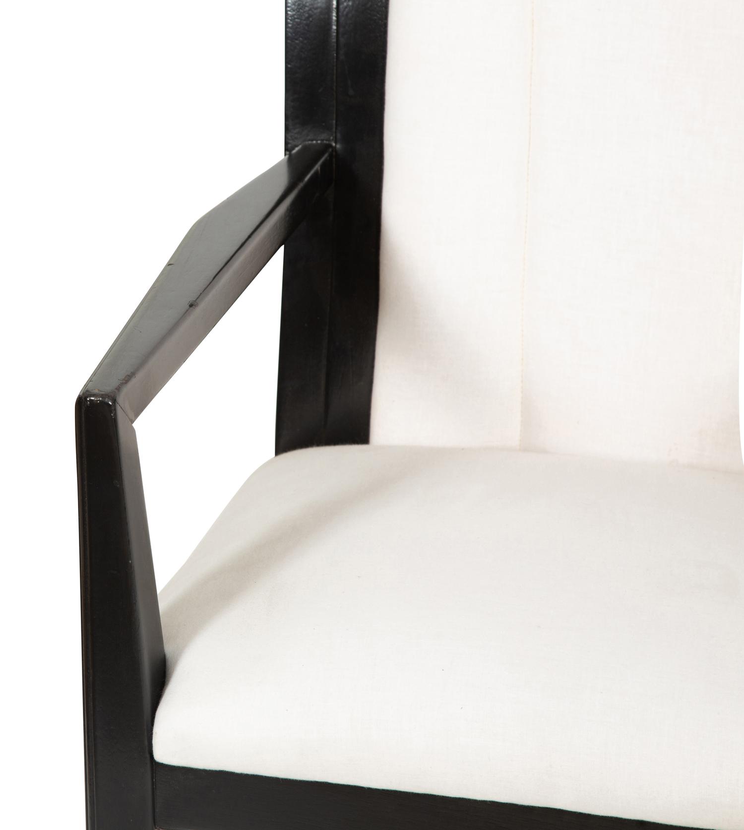 A Set of Four Art Deco Style Ebonized Open Armchairs