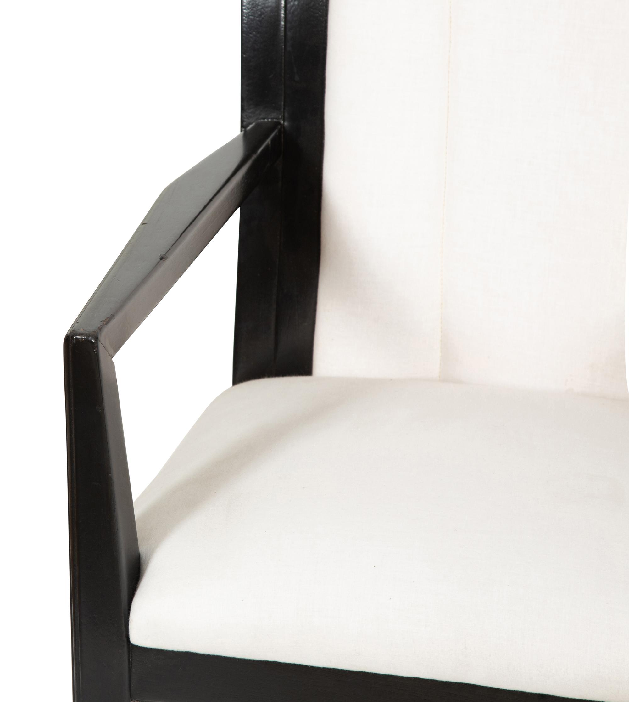 A Set of Four Art Deco Style Ebonized Open Armchairs