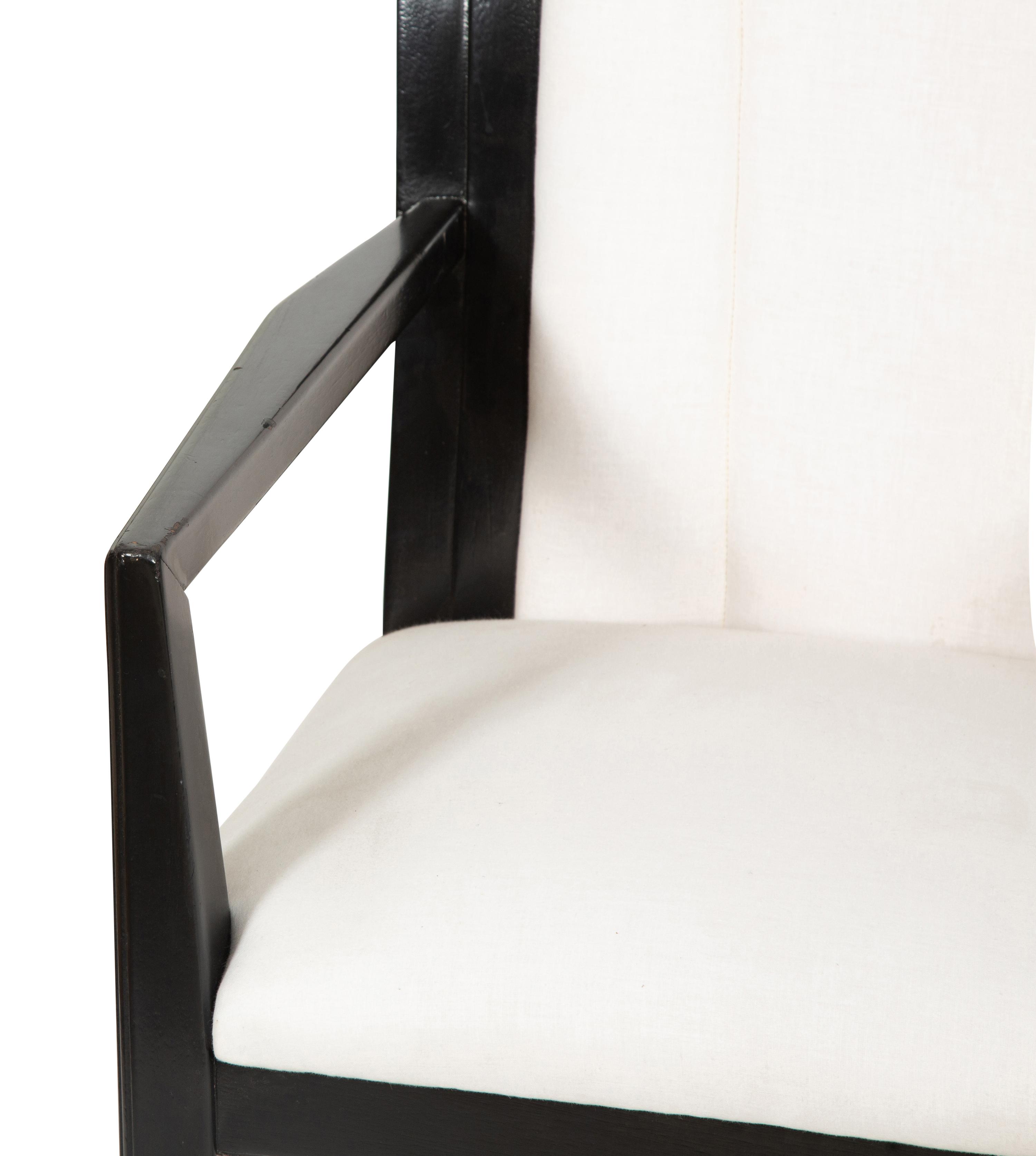 A Set of Four Art Deco Style Ebonized Open Armchairs