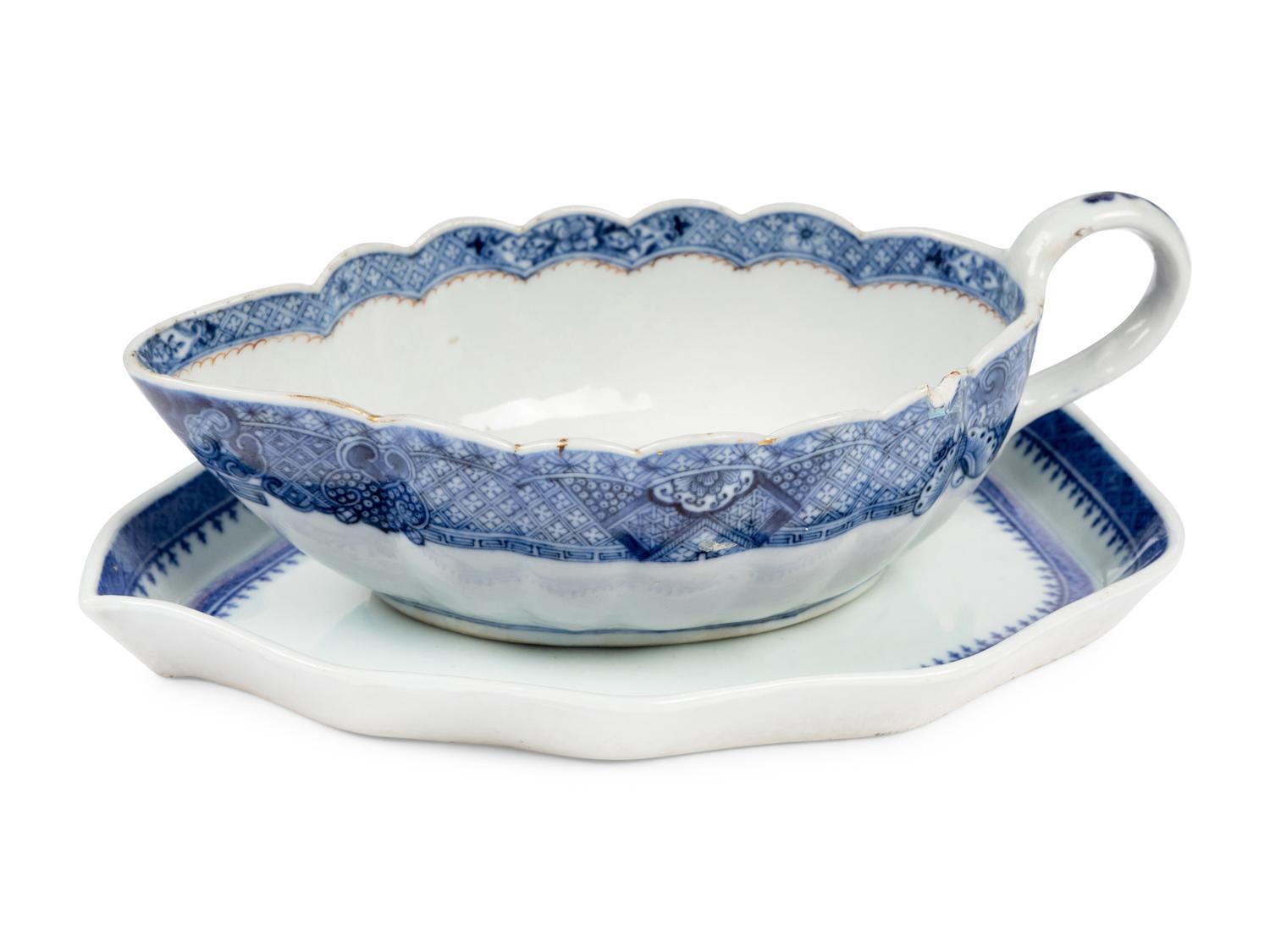 An Assembled Chinese Export Parcel-Gilt Blue and White Porcelain Dinner Service