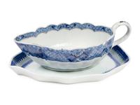 An Assembled Chinese Export Parcel-Gilt Blue and White Porcelain Dinner Service