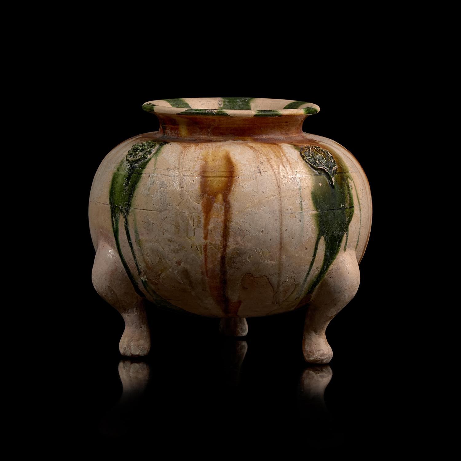 A Chinese Sancai Glazed Tripod Censer, Tang Dynasty 唐 三彩貼塑三足罐